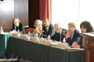 An image of speakers at the Round Table.
